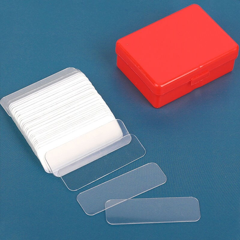 Dubbelhäftande tejpklistermärken